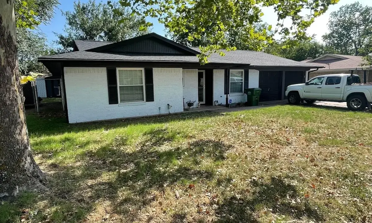 Professional roofing crew working on a residential roof in American Canyon